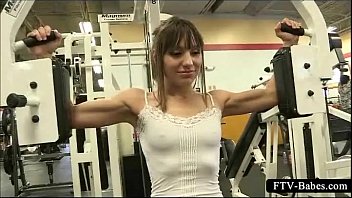 Teen sex siren working out topless at the gym