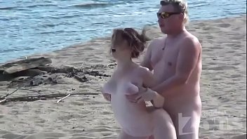 Candid couple fucking on nude beach
