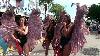 street festival with alot of girls flashing tits and pussy for beads