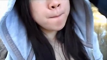 My cute asian girlfriend sucking me off in a public park and swallowing