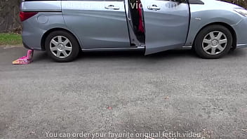 Woman enjoys running over girl's toys with her car.