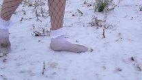 Walking in the snow and on wearing 4.5 inch high heel stilettos and white lace socks