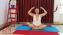 A girl with panties is engaged in yoga. The bitch takes off yoga leotards and shows her pussy.